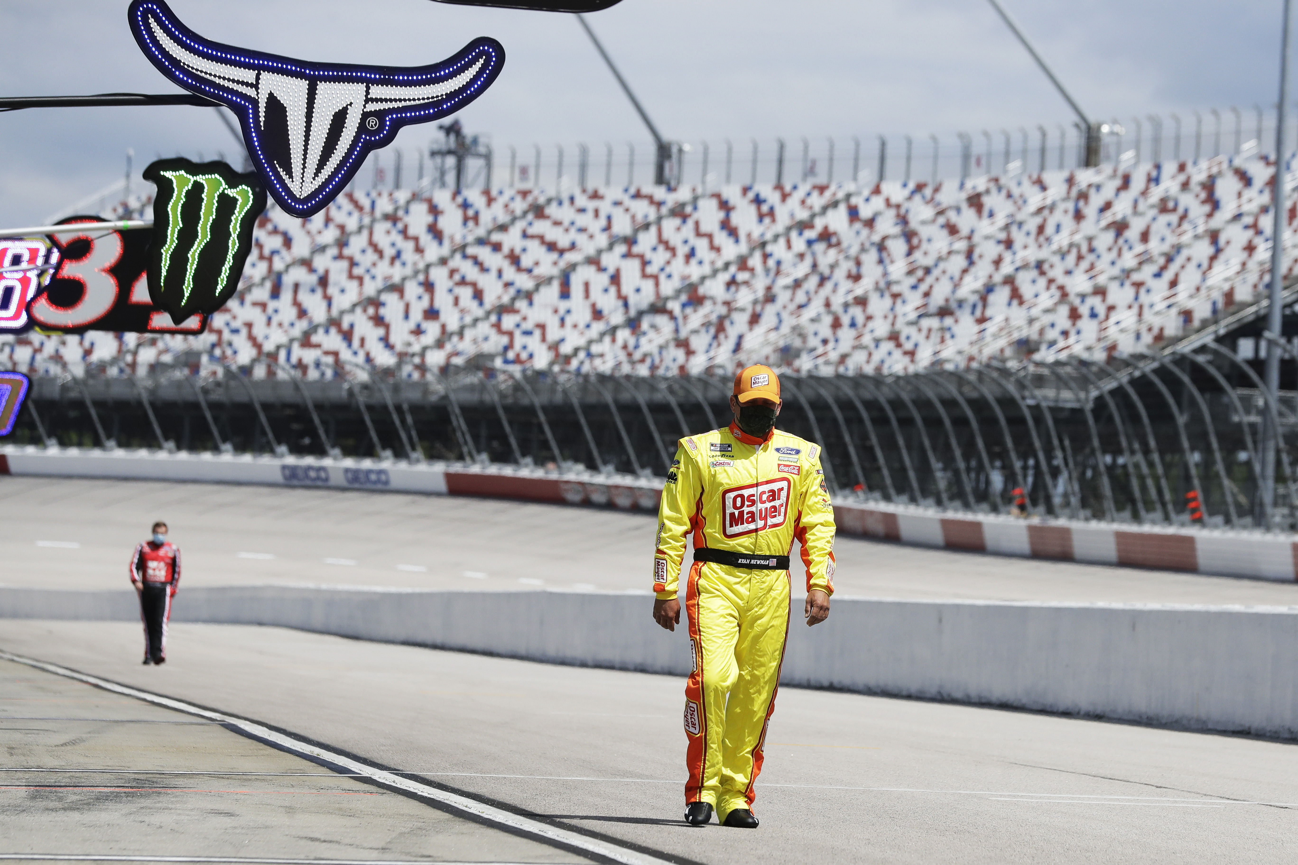 Ryan Newman walks to his car for the start of the NASCAR Cup Series race at Darlington. Source: Imagn